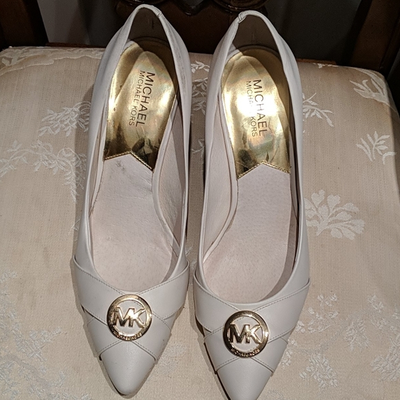 cream leather pumps